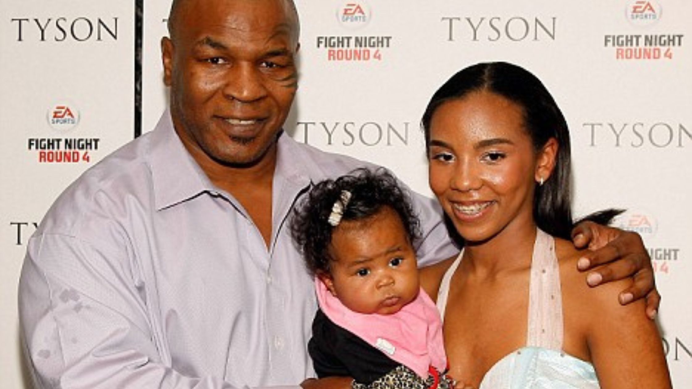 Sol Xochitl and Mike Tyson with Child