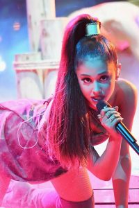 ariana grande sexy pictures in pink dress holding mic