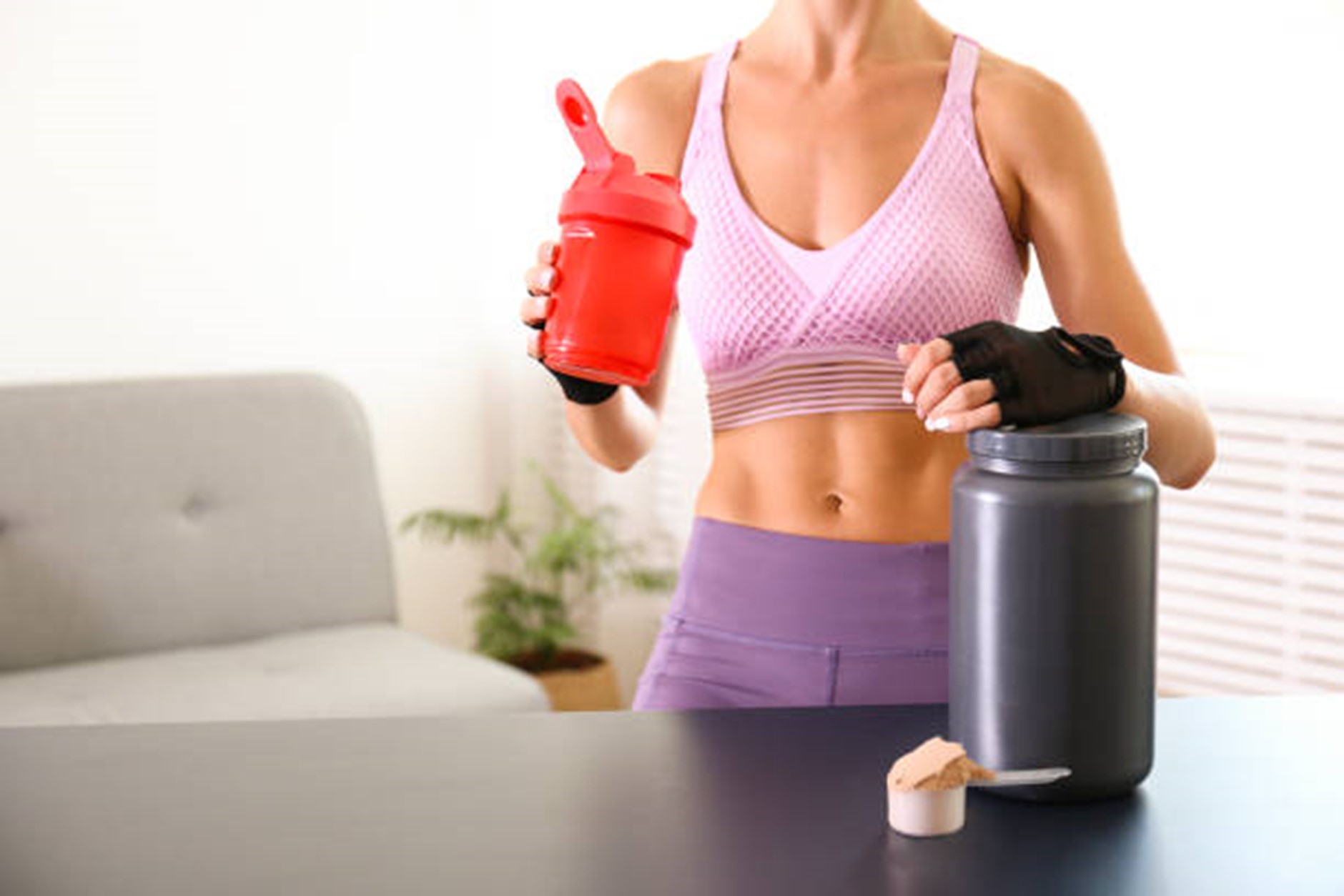 women taking pre workout supplements