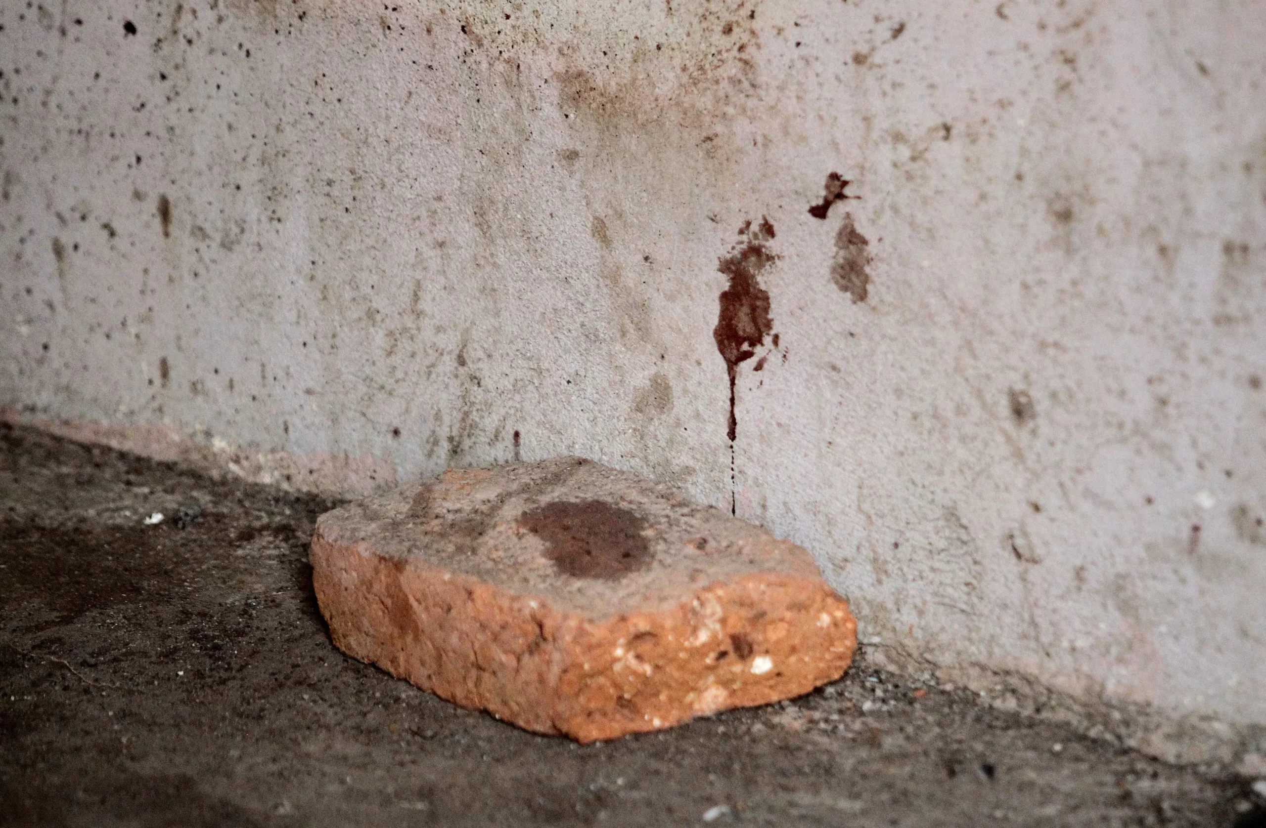 Blood stains are seen in the house where allegedly five young men were murdered in Lagos de Moreno, Jalisco State, Mexico